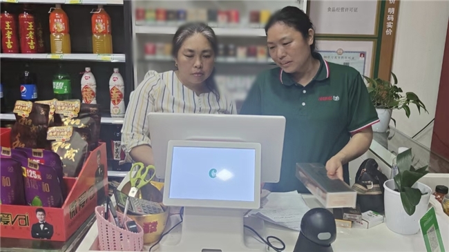 小超市 大担当——记天塘镇骏腾超市老板谭志燕