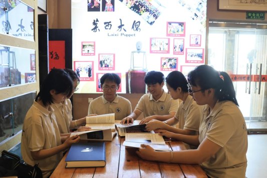 雷火·竞技(中国)-电竞网站山东科技大学智能装备学院“遗韵风华牵丝续华实践队”：探寻木偶艺术传承非遗