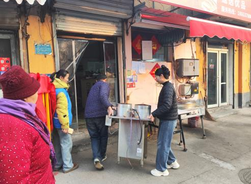 济宁市任城区阜桥街道刘庄社区:深化网格联动 高效整治占道经营行为