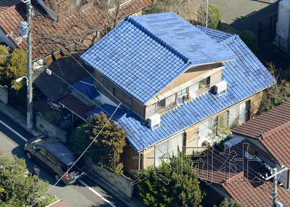 资料图片：日本警方３月搜查许宗万的住宅。图片来源：共同社