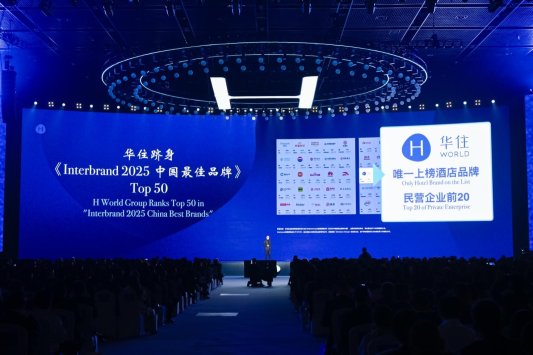 A large screen with a large screen with a crowd of people in the background

AI-generated content may be incorrect.