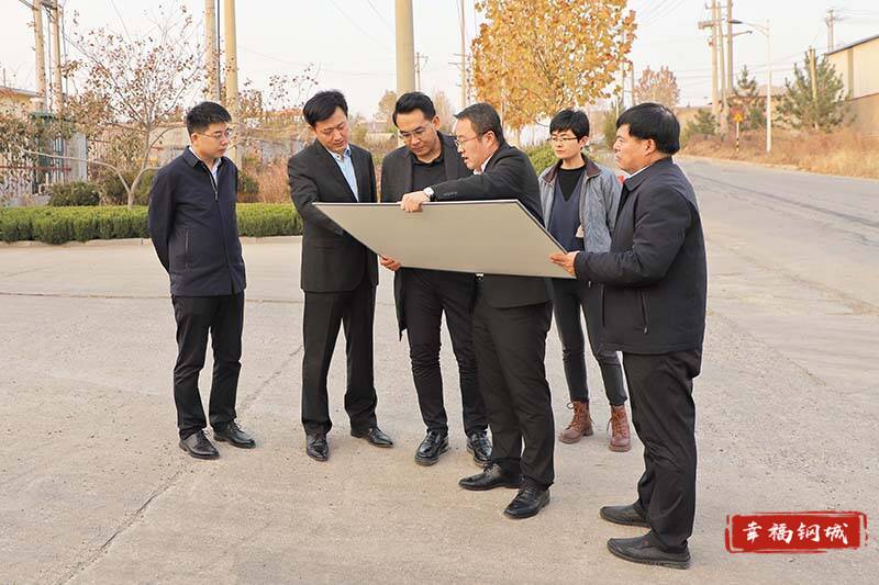万洋集团青岛公司到钢城区考察洽谈