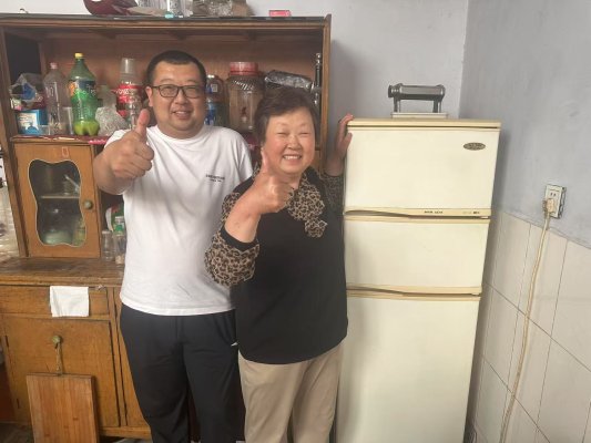 D:泰安老用户故事家人合影.jpg