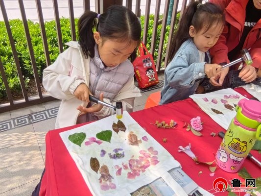 春染布间藏雅趣，童心逐暖赴清欢